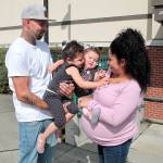 Daniel and Adriana Aivles stand with their daughters, Summer (left) and Heaven, last week after graduating from family treatment court. Photo by Laura Guido/Whidbey News-Times