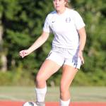 Natalie Plush controls the ball for the Wildcats.(Photo by John Fisken)
