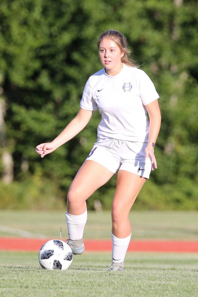 Natalie Plush controls the ball for the Wildcats.(Photo by John Fisken)