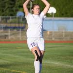 Chloe Wallace tosses the ball in for Oak Harbor.(Photo by John Fisken)