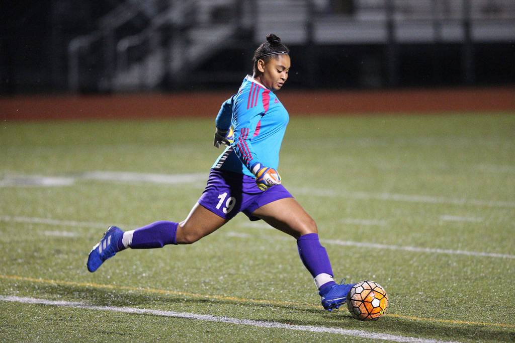 Oak Harbor keeper Tiana Jackson puts the ball back into play.(Photo by John Fisken)