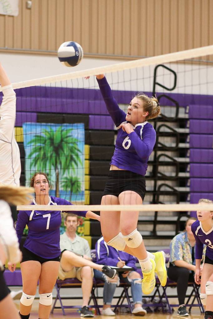 Payton Parks collects a kill for the Wildcats.(Photo by John Fisken)