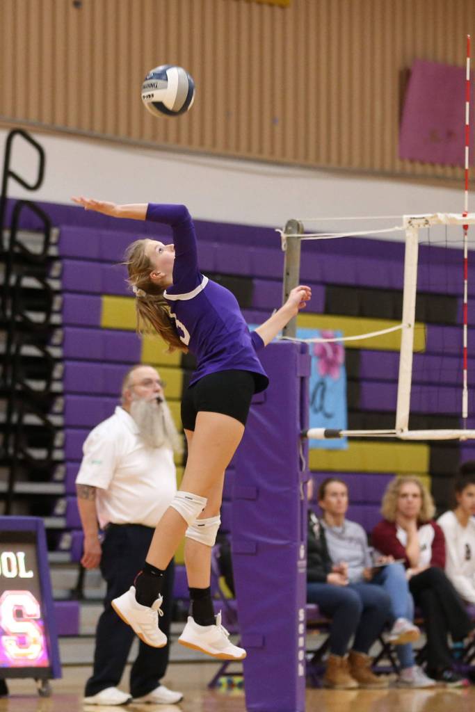 Lacey Zylstra hits in Tuesdays match with Cedarcrest.(Photo by John Fisken)