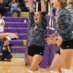 Leielle Salinger and Lacey Zylstra (right) enjoy a Wildcat point.(Photo by John Fisken)