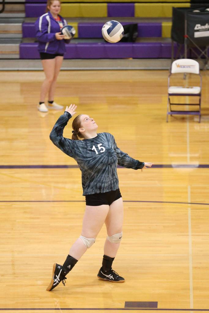 Emily Lamb comes off the bench to serve for the Wildcats.(Photo by John Fisken)