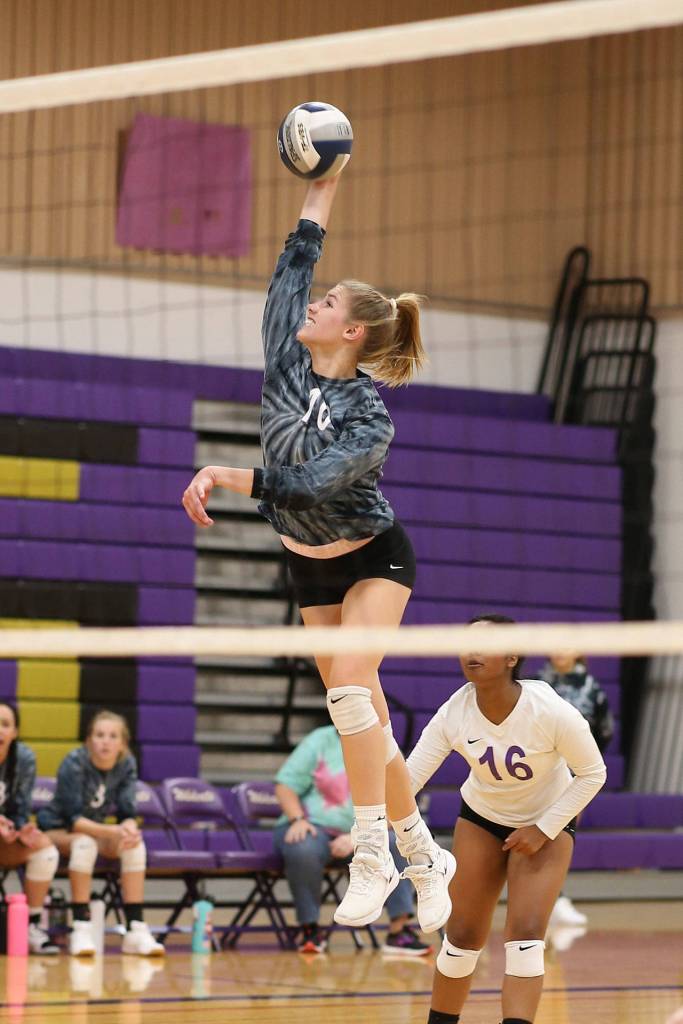 Morgan Pease rockets a hit at Shorecrest.(Photo by John Fisken)