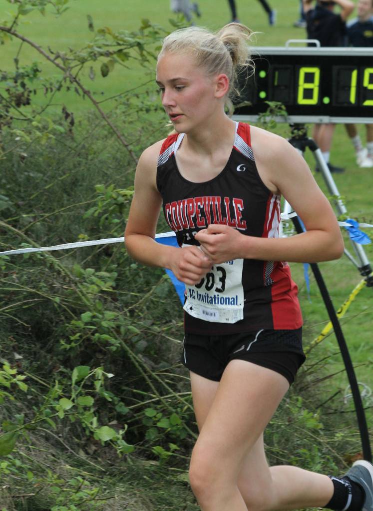 Cristina McGrath begins the second loop of the course Saturday.(Photo by Jim Waller/Whidbey News-Times)