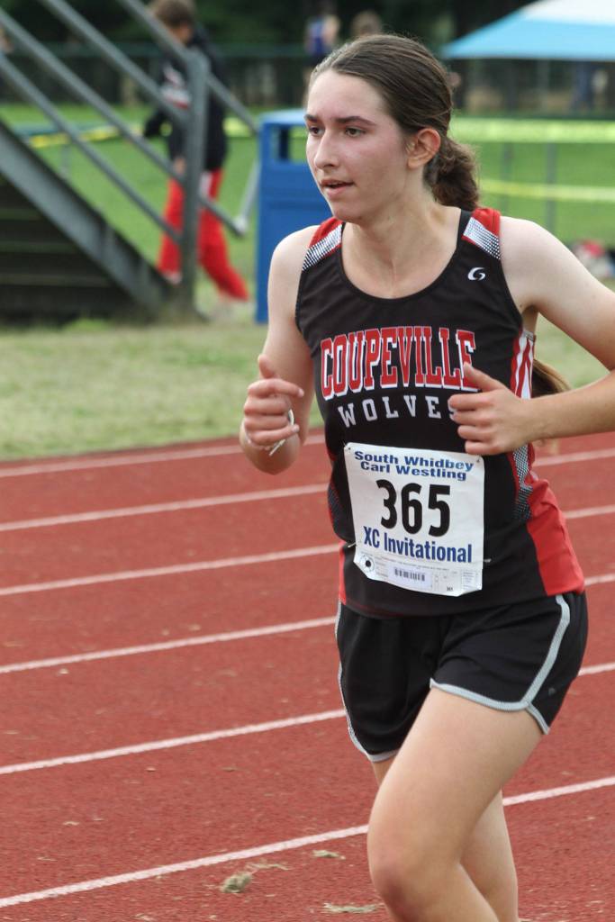 Helen Strelow nears the finish line for the Wolves.(Photo by Jim Waller/Whidbey News-Times)
