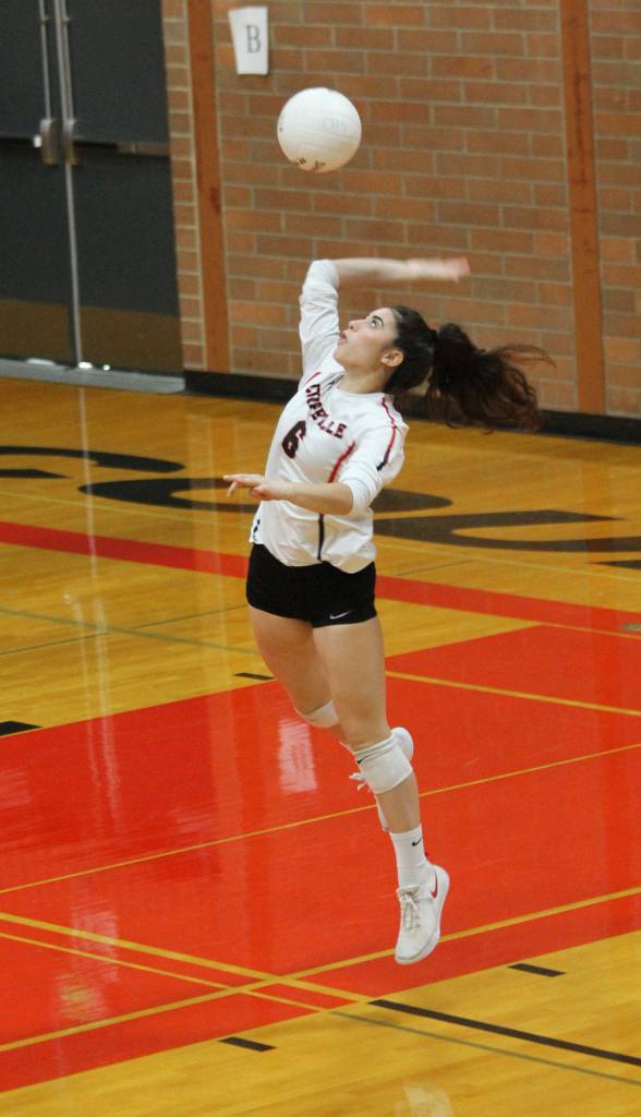 Raven Vick fires a serve in Saturdays win.(Photo by Jim Waller/Whidbey News-Times)