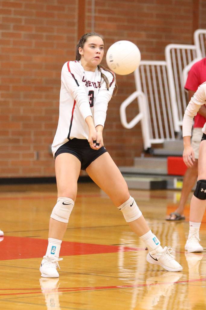 Maya Toomey-Stout gets the offense started with a pass.(Photo by John Fisken)