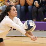 Gredina DeGuzman passes the ball for the Wildcats.(Photo by John Fisken)