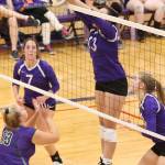 Jasmine Ford blocks an Edmonds-Woodway hit.(Photo by John Fisken)