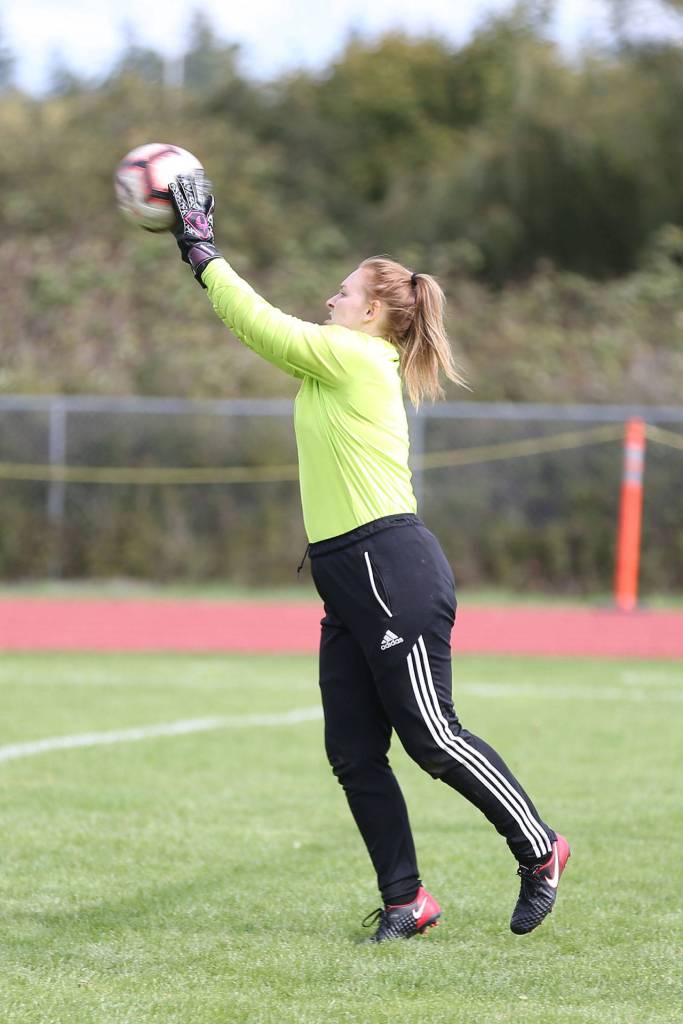 Sam Streitler stops a shot for the Wolves.(Photo by John Fisken)