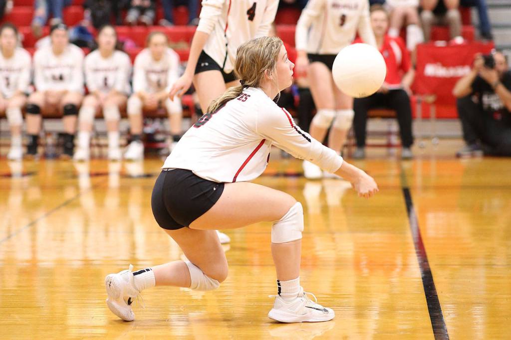 Lucy Sandahl gets the offense going with a pass.(Photo by John Fisken)