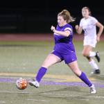 Morgan Lamar takes possession for Oak Harbor. She later scored the game-winning goal for the Wildcats.(Photo by John Fisken)