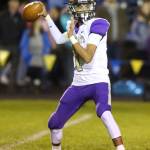 Oak Harbors Cameron Asinsin sets up to pass. (Photo by John Fisken)