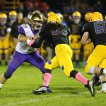 Jackson Higman, left, blocks Ferndales Malachi Ledbetter.(Photo by John Fisken)