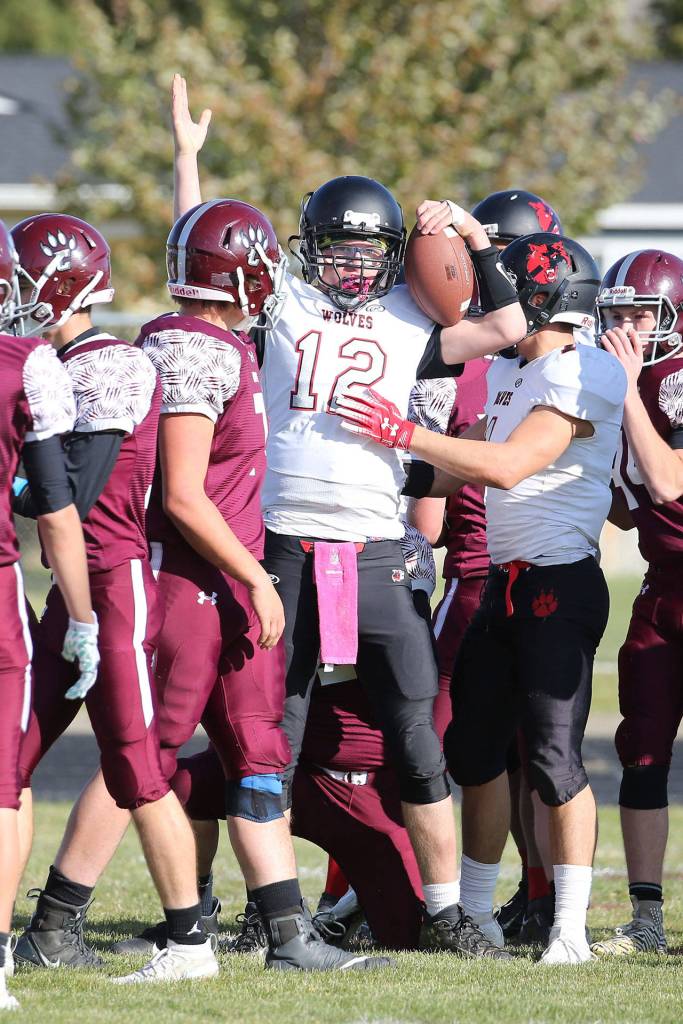 Houston Dawson (12) celebrates a Coupeville touchdown.(Photo by John Fisken)