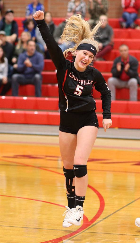 Emma Mathusek celebrates a Coupeville point.(Photo by John Fisken)