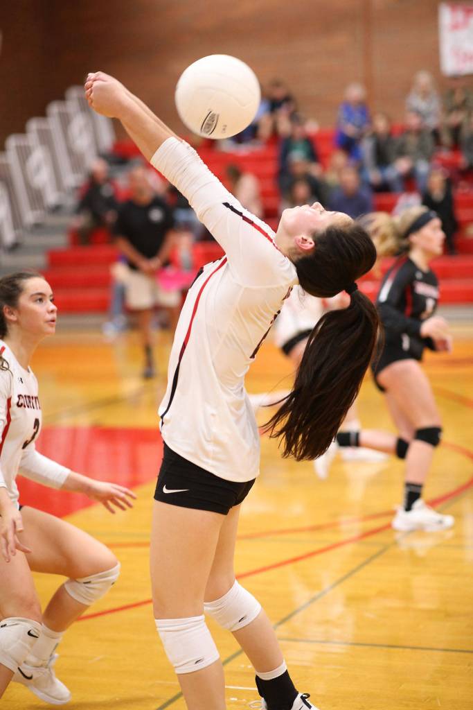 Scout Smith passes a free ball over the net.(Photo by John Fisken)
