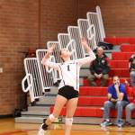 Zoe Trujillo fires a serve against Kings.(Photo by John Fisken)