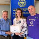 From left to right: Rotary Club president Steve Schwalbe stands with Student of the Month Leielle Salinger and Oak Harbor High School Principal Nate Salisbury,