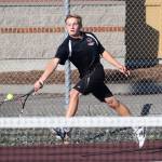 Coupevilles Drake Borden returns a shot in his first singles with Wednesday. (Photo by John Fisken)