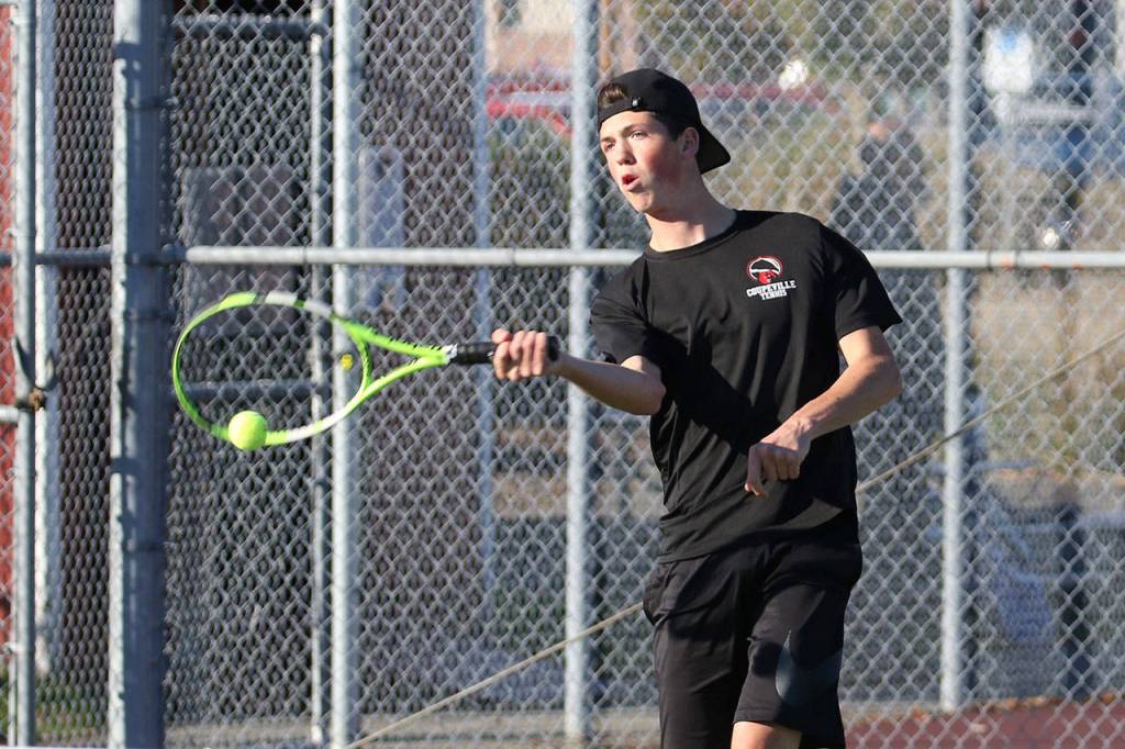 James Wood swaps a shot in first doubles.(Photo by John Fisken)