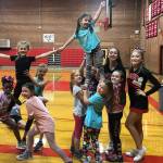 Island youth spread their spirit at camp / Cheer