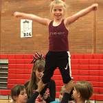 Island youth spread their spirit at camp / Cheer