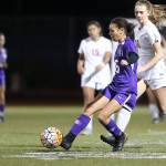 Tessa Hughes takes possession for Oak Harbor.(Photo by John Fisken)