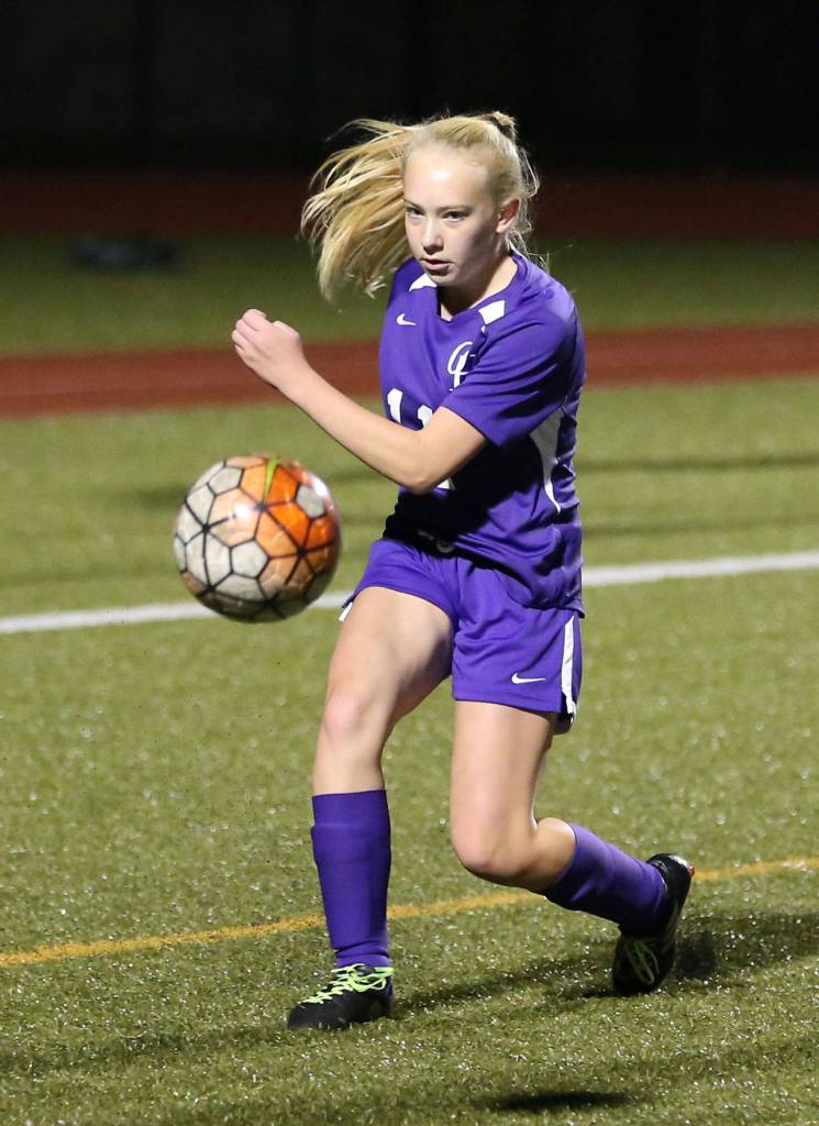 Sydney Lupien pass for Oak Harbor.(Photo by John Fisken)