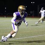 Dominic Dean picks up some yardage on a kickoff return.(Photo by John Fisken)