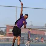 Jerome Dones serves against Mariner.(Photo by John Fisken)