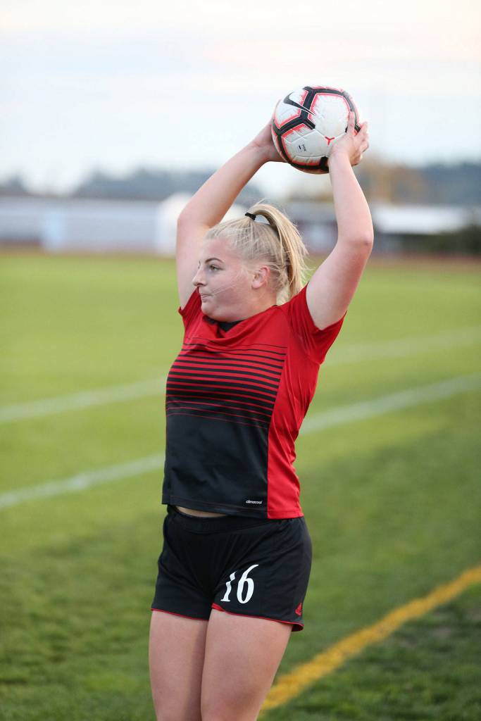 Avalon Renninger gets ready to put the ball back into play.(Photo by John Fisken)