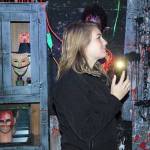 Nikki Barone, unit director for the Oak Harbor Boys Girls Club, nervously travels through Frightville. The annual haunted house may be in its final year. Photo by Laura Guido/Whidbey News-Times