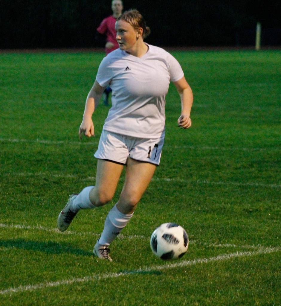 Audrianna Shaw surveys the field for an open teammate.(Photo by Jim Waller/Whidbey News-Times)