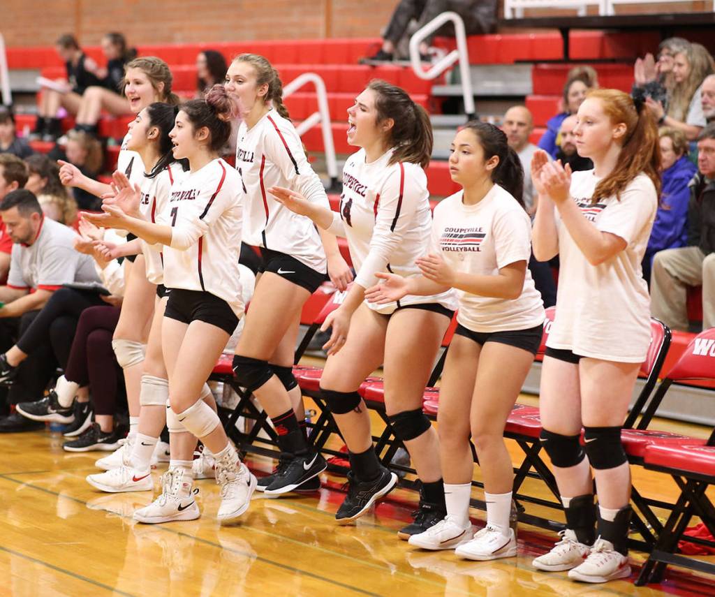The Coupeville bench likes what it sees on the court. (Photo by John Fisken)
