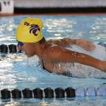 Diandra Dominguez swims the butterfly leg of the individual medley.(Photo by John Fisken)
