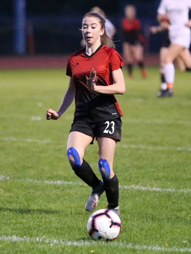 Sophia Martin advances the ball for the Wolves.(Photo by John Fisken)