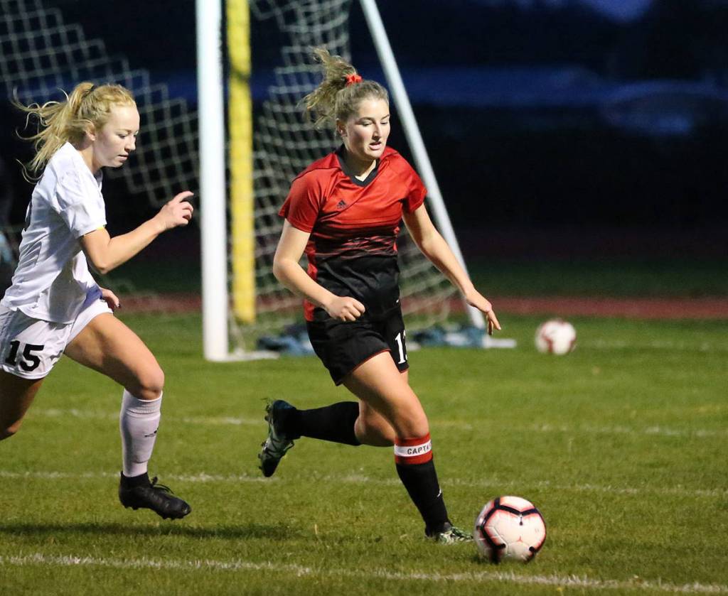 Tia Wurzrainer blows by a Granite Falls player in Wednesdays contest.(Photo by John Fisken)