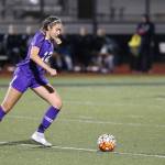 Oak Harbors Mikhaela Cortez, a four-year starter, puts the ball back into play.(Photo by John Fisken)