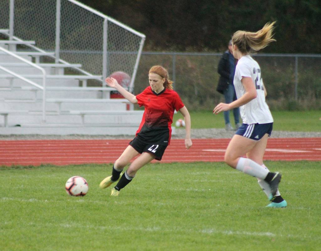 Coupevilles Anna Dion shoots in the Wolves win Thursday. Later in the match, Dion scored the winning goal. (Photo by Jim Waller/Whidbey News-Times)