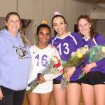 Oak Harbor volleyball coach Kerri Molitor, left, and seniors Jaslin Webster, Jasmine Ford and Leielle Salinger.