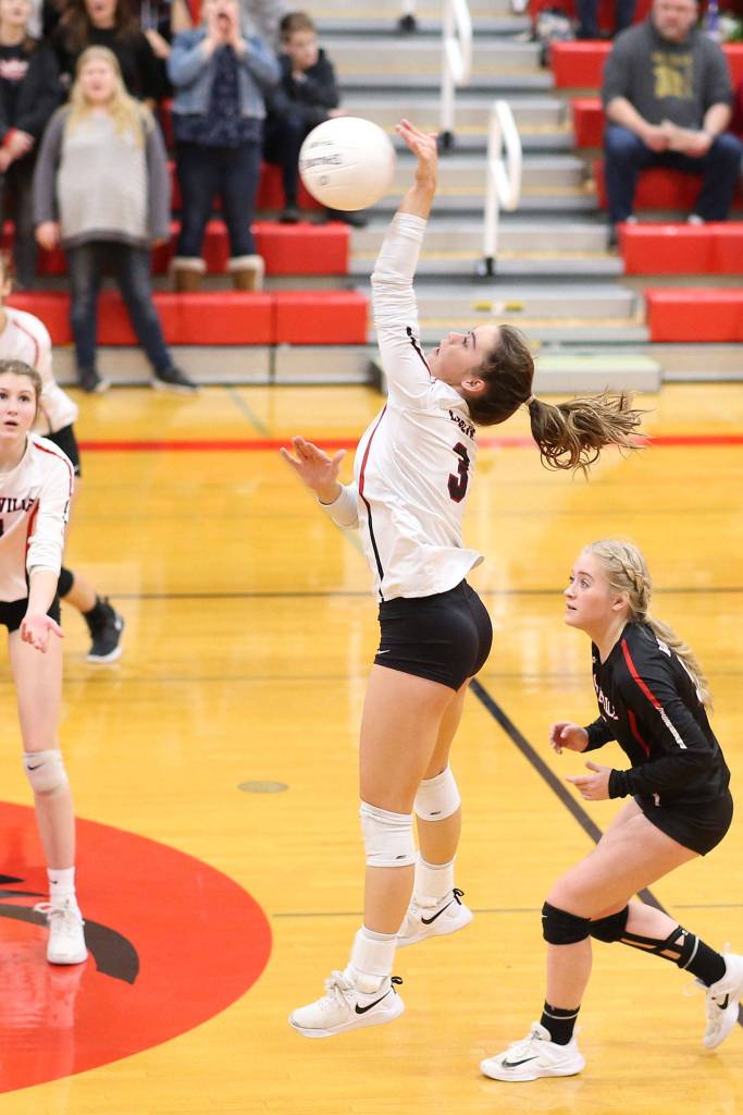 Maya Toomey-Stout hits for the Wolves. The senior had 39 kills over two matches Tuesday.(Photo by John Fisken)