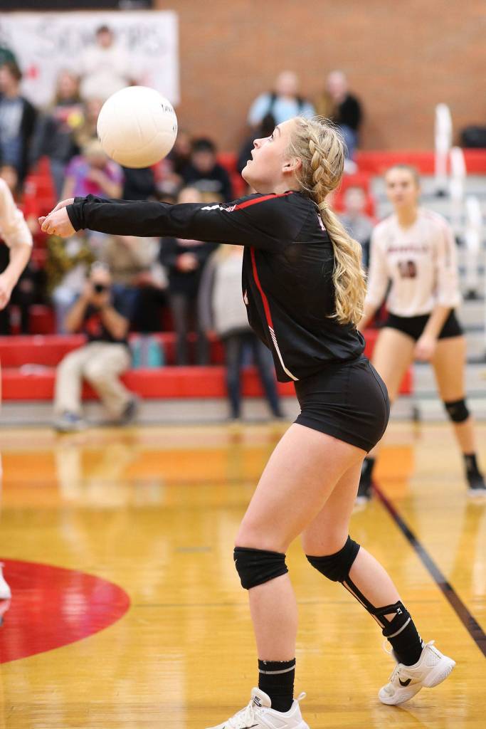 Emma Mathusek gets the Coupeville offense started with a pass.(Photo by John Fisken)