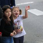 Photo by Laura Guido/Whidbey News-Times                                Piper Ponce, left, and Dylan Van Allen watch the Veterans Day Parade Monday afternoon on Pioneer Way.