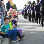 Photo by Laura Guido/Whidbey News-Times                                From foreground, Luke Marriott, Connor Willis, Wren Jorden, Wren Willis, Paisley Jorden, and Maddie Lewis watch the Oak Harbor High School marching band Monday afternoon at the Veterans Day Parade.