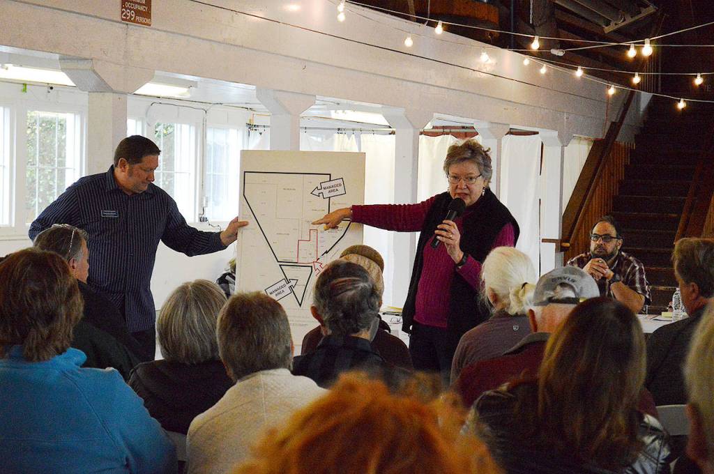 June Davis, who said her background is in horticulture, points out areas designated for agriculture at Greenbank farm that would be ill suited for growing anything.