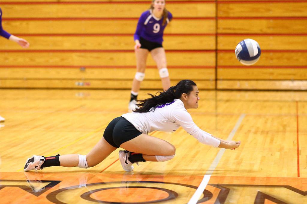 Gredina DeGuzman dives to make a save for the Wildcats.(Photo by John Fisken)
